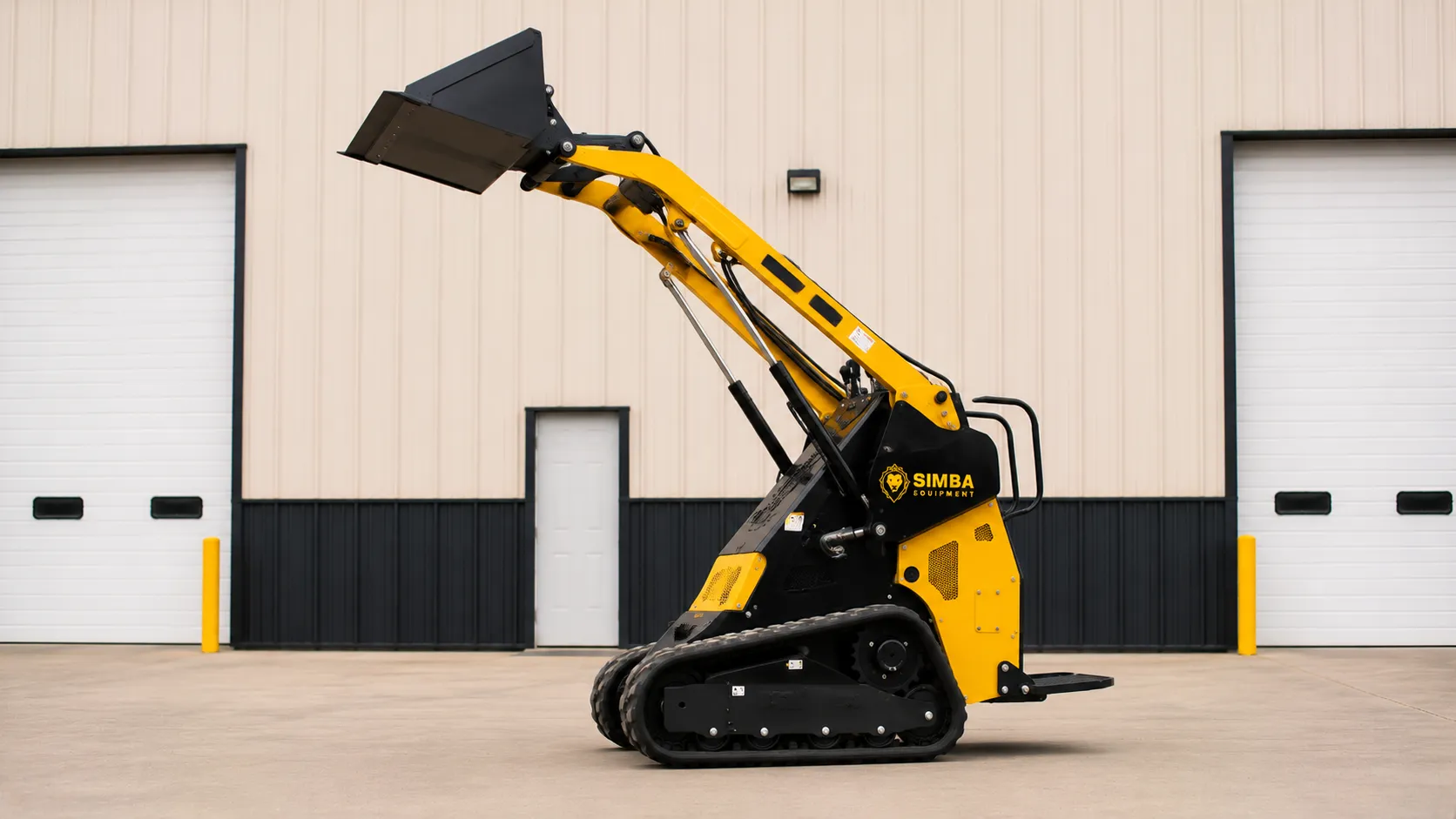 Mini skid steer with bucket raised